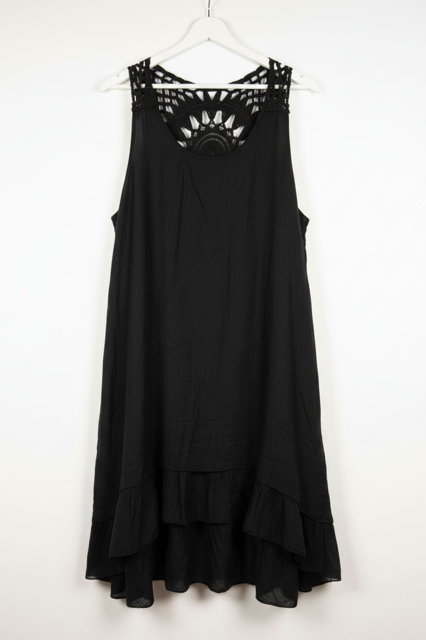 Vestido negro crochet espalda - pared