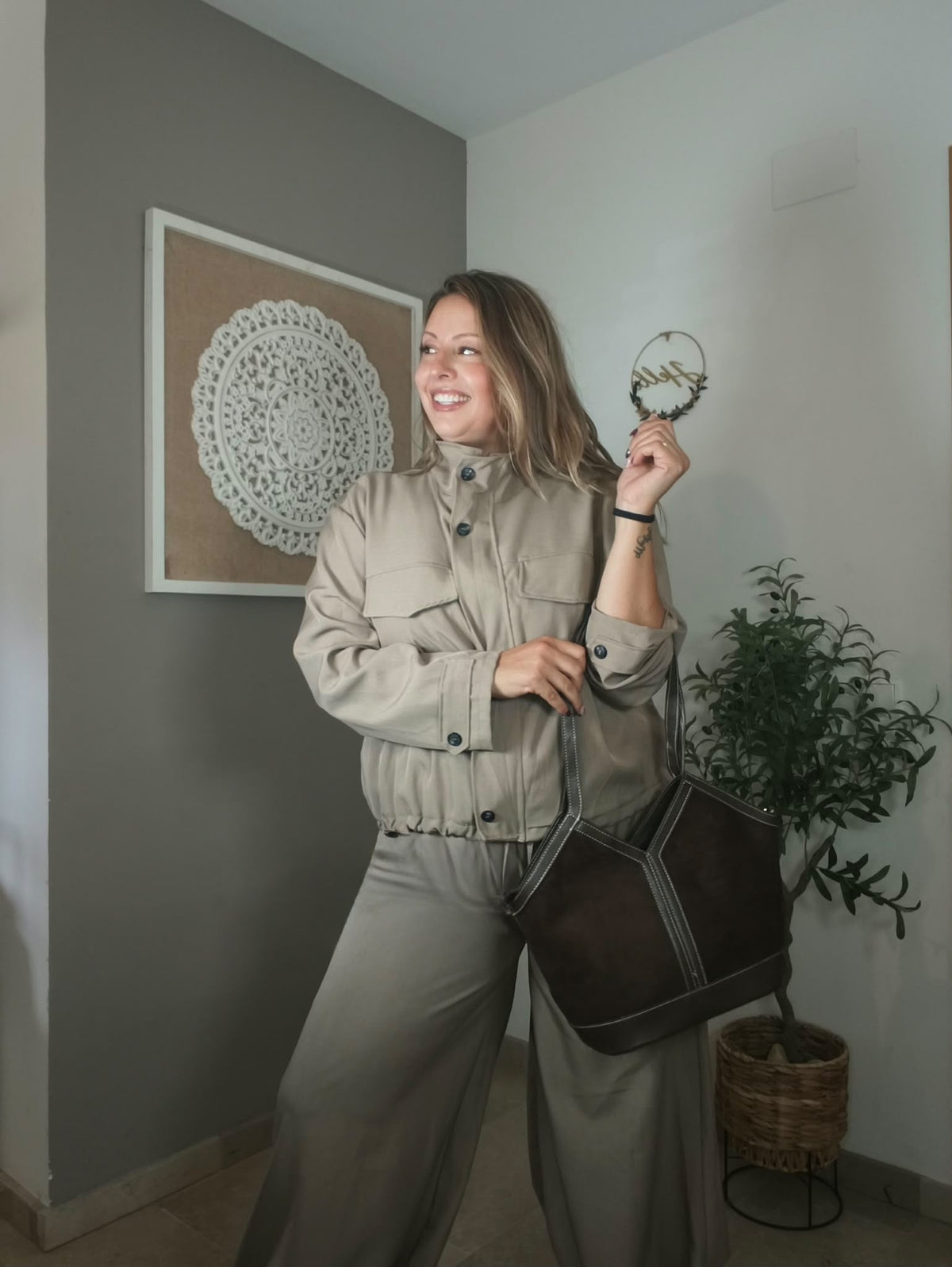 Bomber de cuello alto y botones