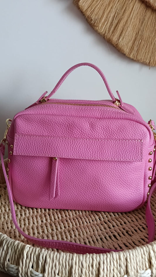 Bolso bandolera rosa de Piel con detalles dorados