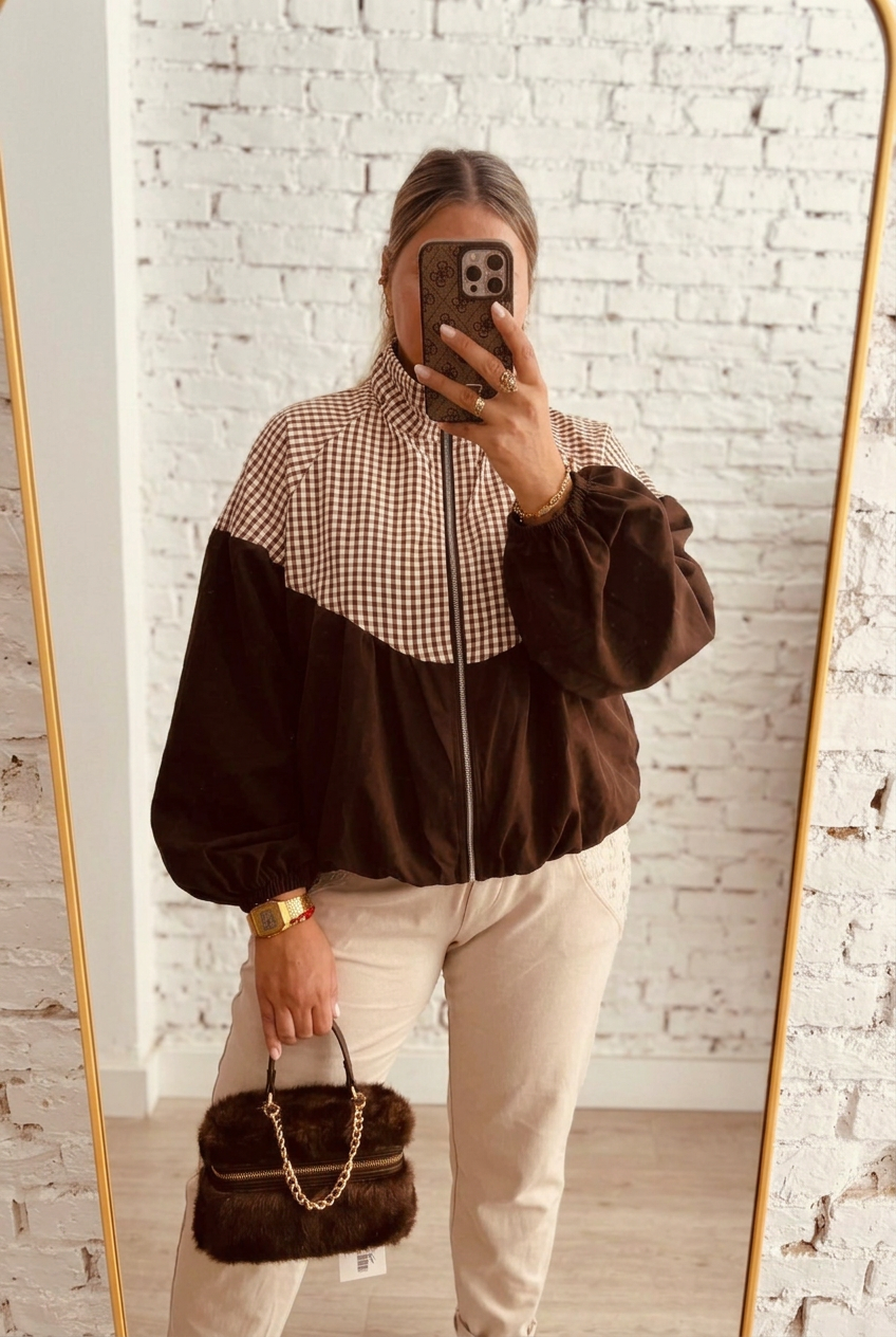 Bolso de pelo marrón chocolate con cadena dorada